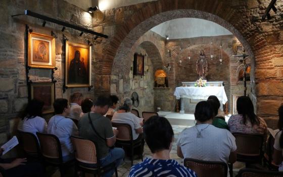 Visitors pray inside the Ephesus House, a replica of the House of the Virgin Mary in Ephesus, Turkey, at Alfonso town, Cavite province, Philippines on July 16, 2026. (AP/Aaron Favila)