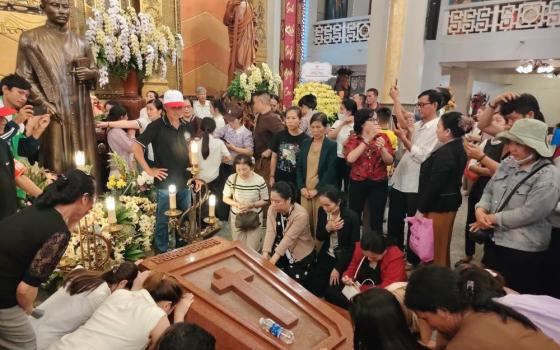 Pilgrims pray by the tomb of Blessed Francis Xavier Truong Buu Diep at Tac Say Pilgrimage Center in Vietnam's Mekong Delta on July 1, 2026. (OSV News/Joachim Pham)